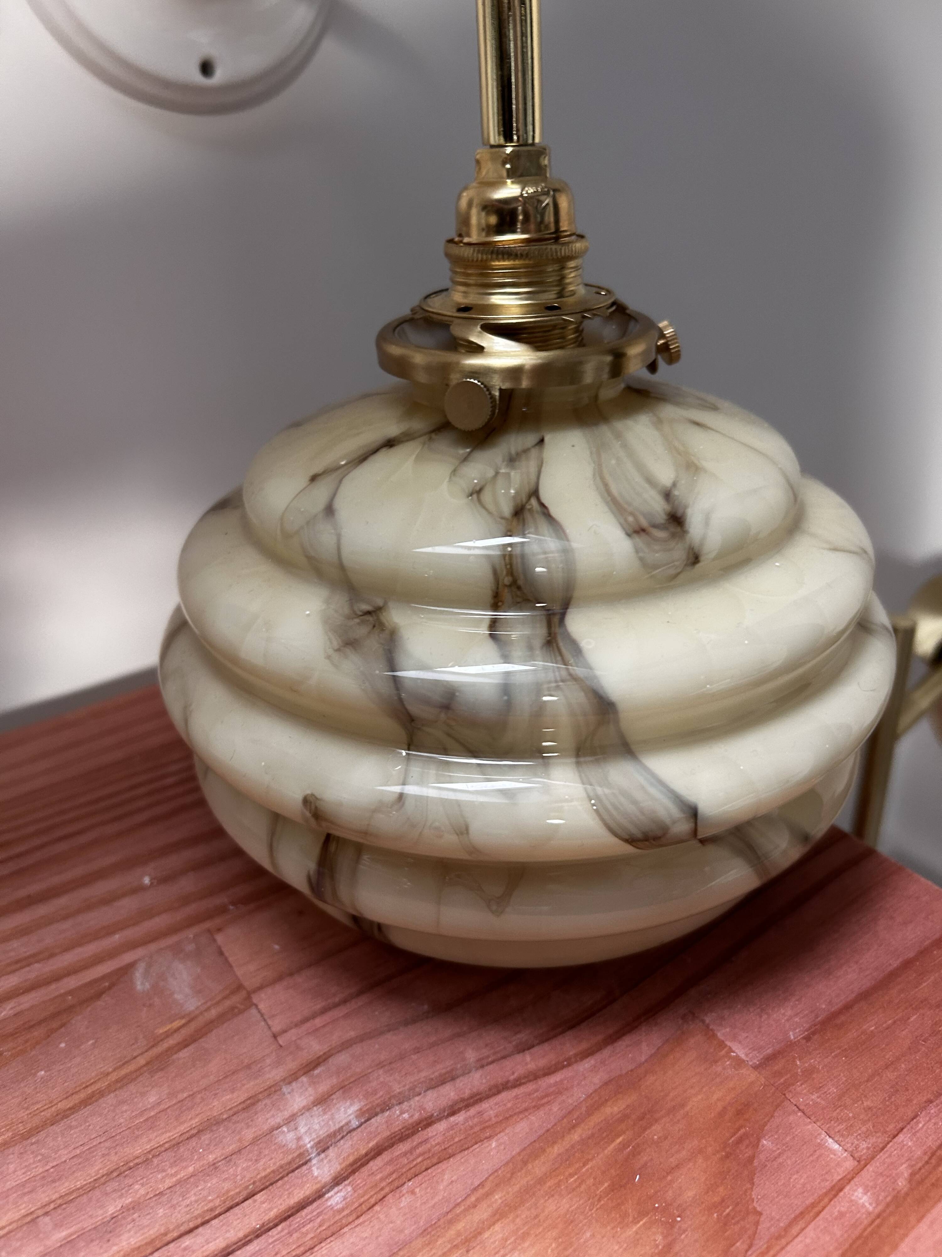 Pair of vintage marbled opaline globe wall lights