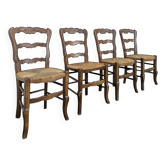 Set of 4 rush-seated chairs in Louis XV style.