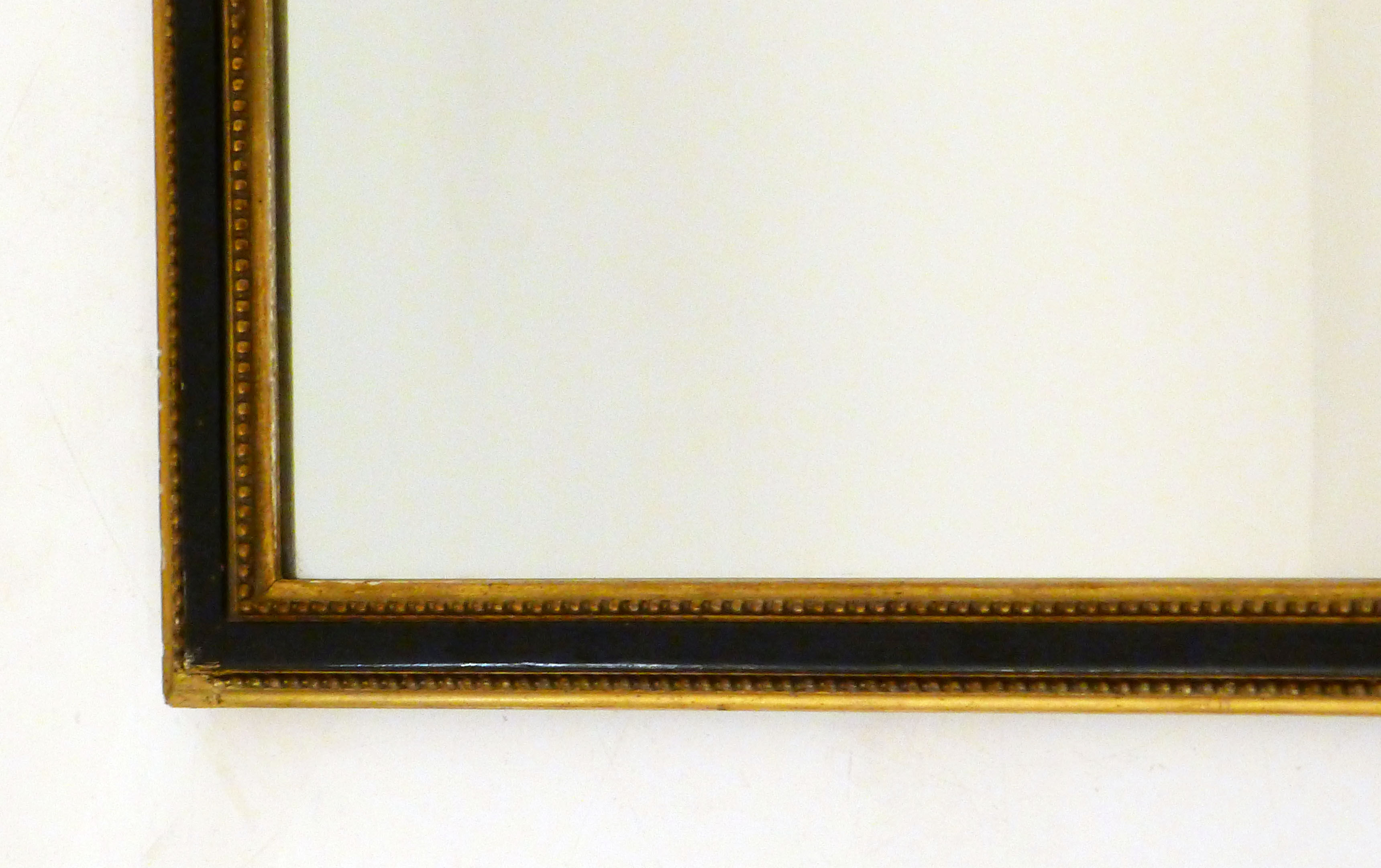 Miroir noir et frises de perles dorées - 42x42cm