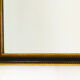 Miroir noir et frises de perles dorées - 42x42cm