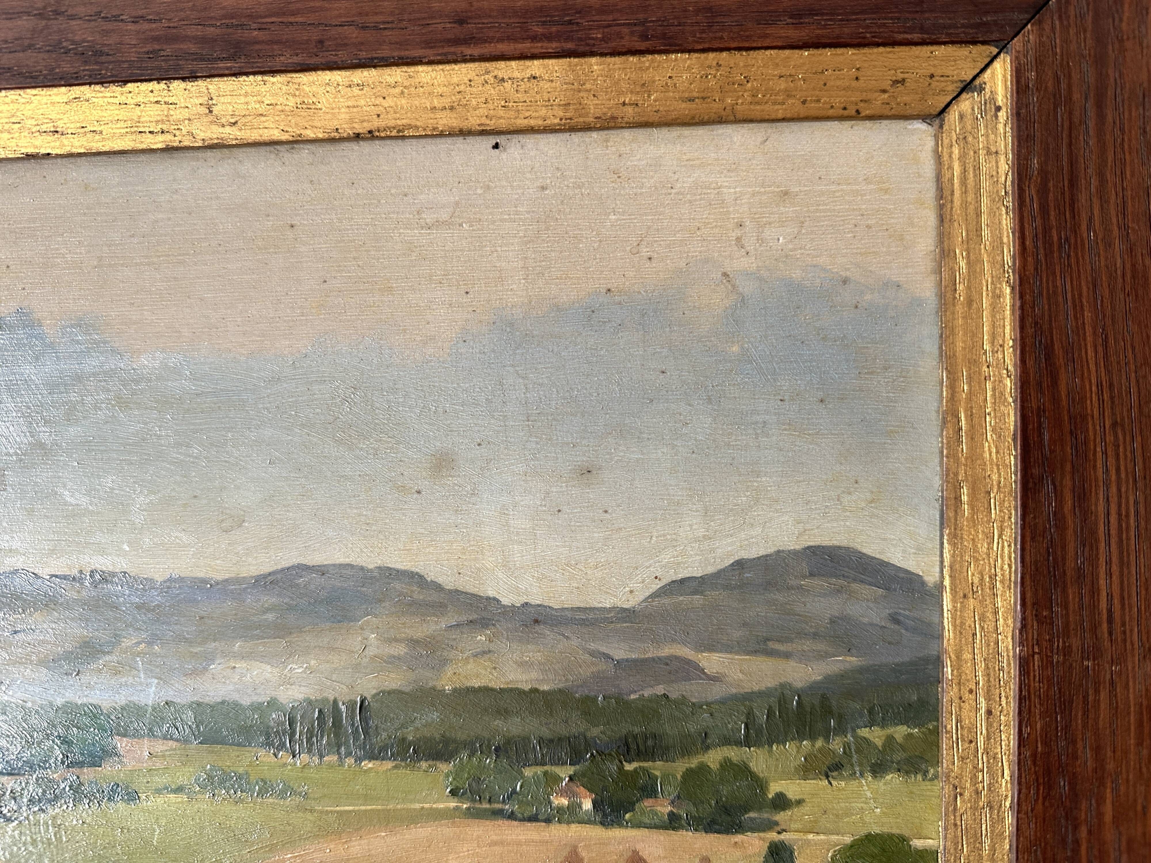 Old oil painting of a landscape on panel from 1920, haystacks.