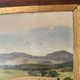 Old oil painting of a landscape on panel from 1920, haystacks.