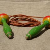 Old wooden jump rope toy painted in the shape of pear fruit ref