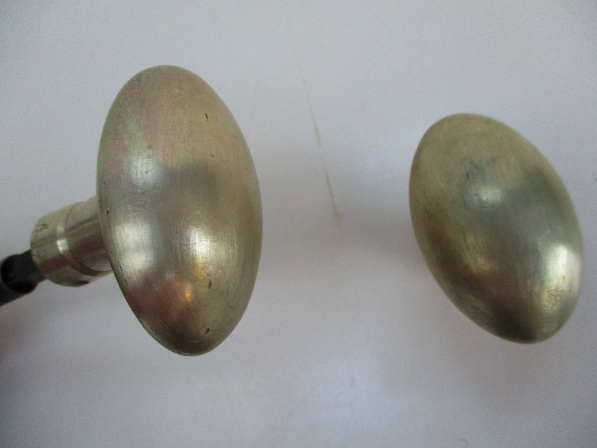 Antique oval brass door handles