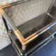 Console shelf smoked glass aluminum and brass