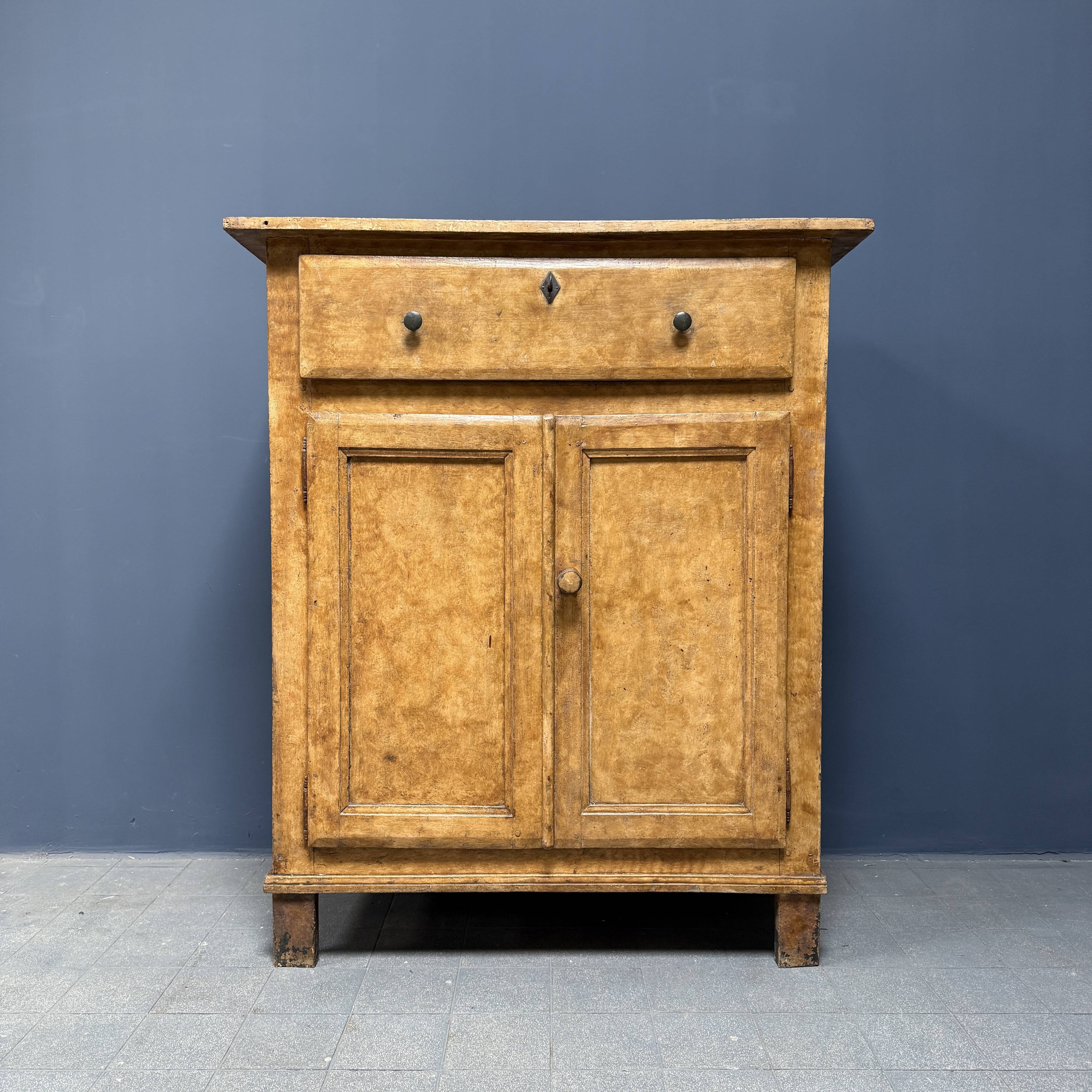 Old marbled ochre yellow French farmhouse cabinet