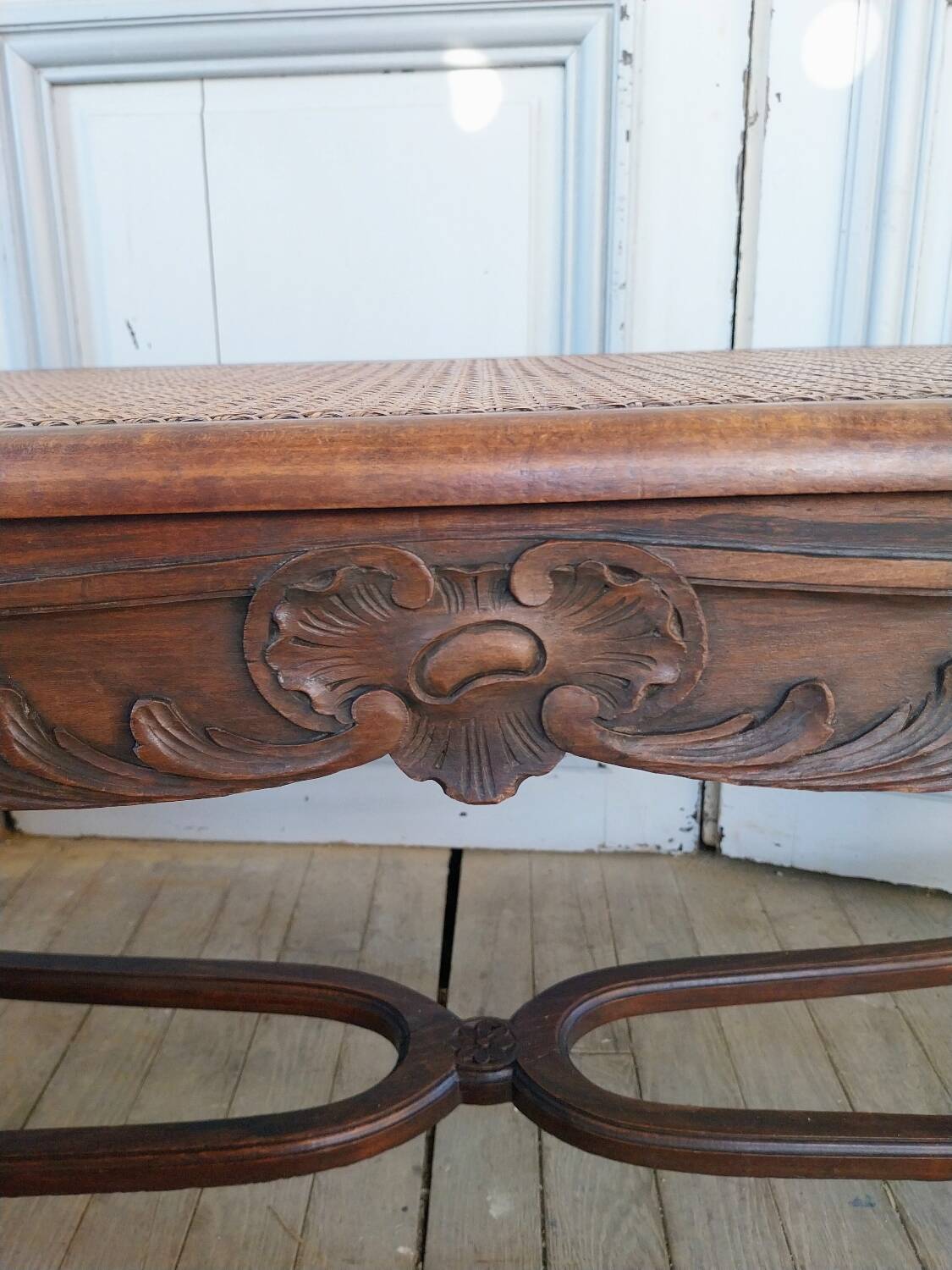 Louis XV style bench with cross-braced design