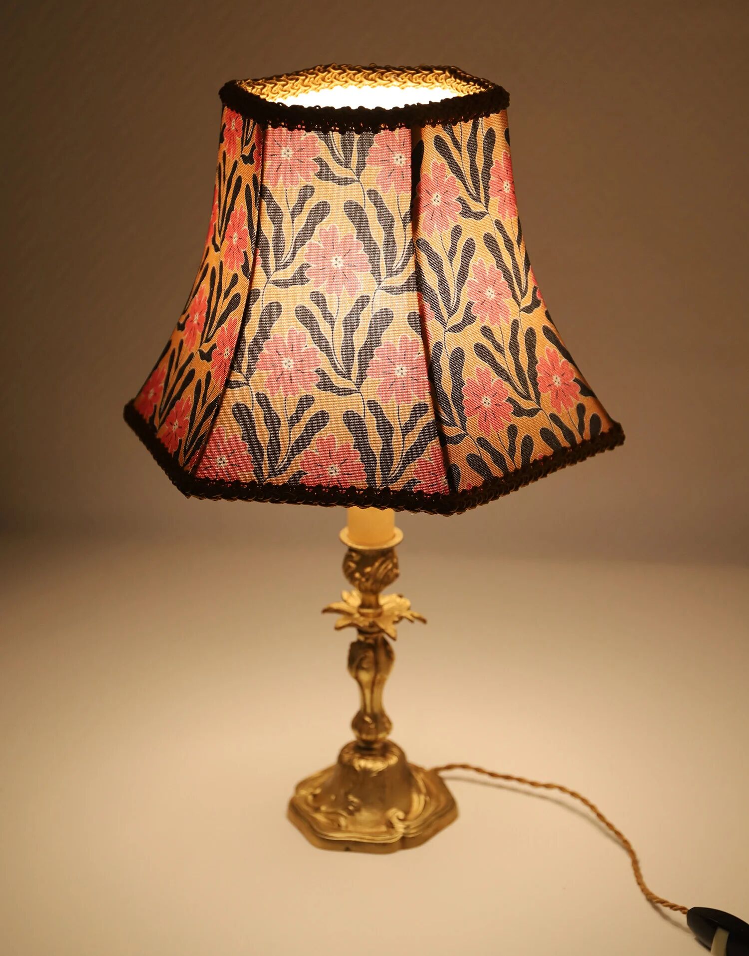 Recycled vintage lamp — antique bronze candlestick base and graphic flowers