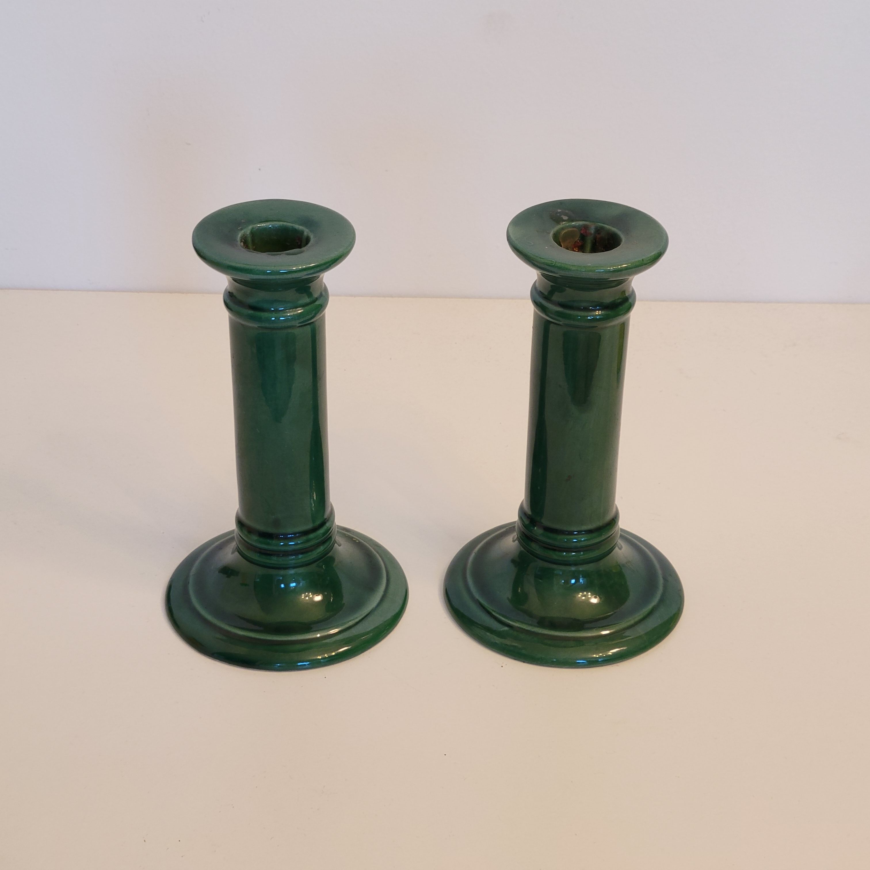 Pair of green ceramic candle holders