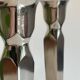 Pair of vintage cast aluminum candlesticks