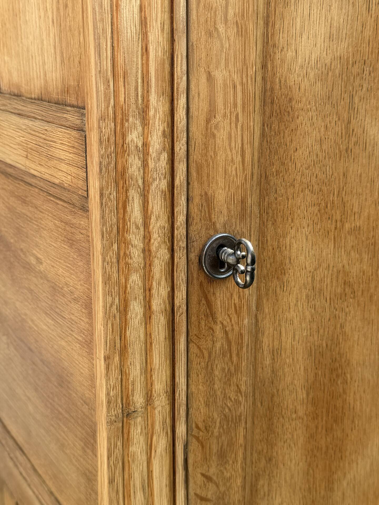 Parisian Art Deco wardrobe in raw oak, renovated.
