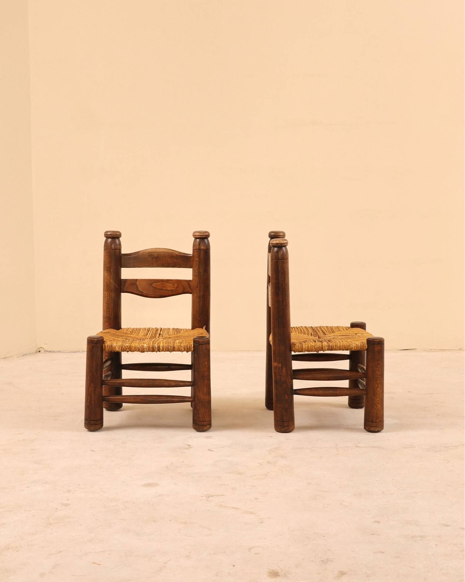 Low fireplace chair attributed to Charles Dudouyt.