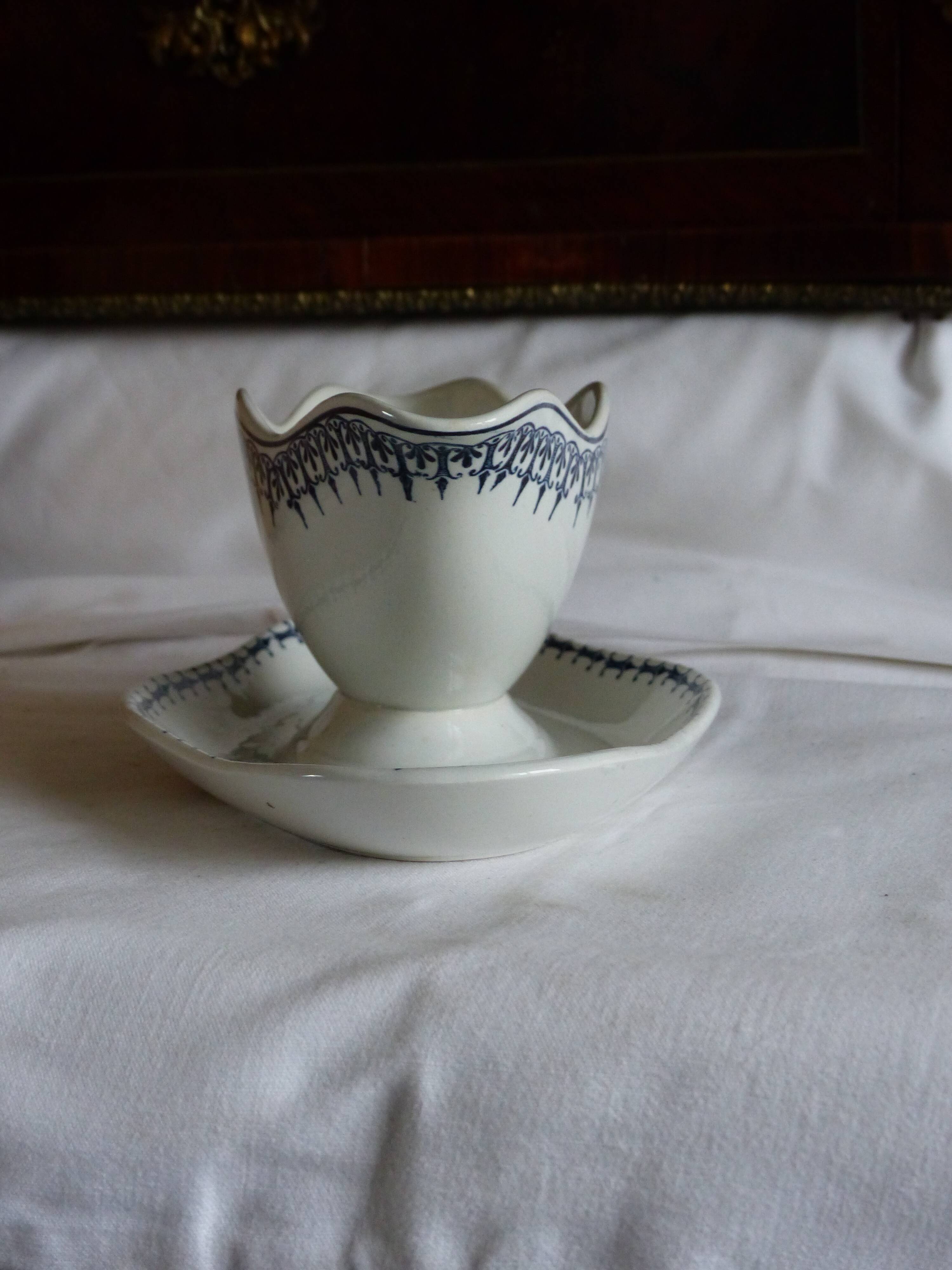 Earthenware gravy boat from Saint Amand.