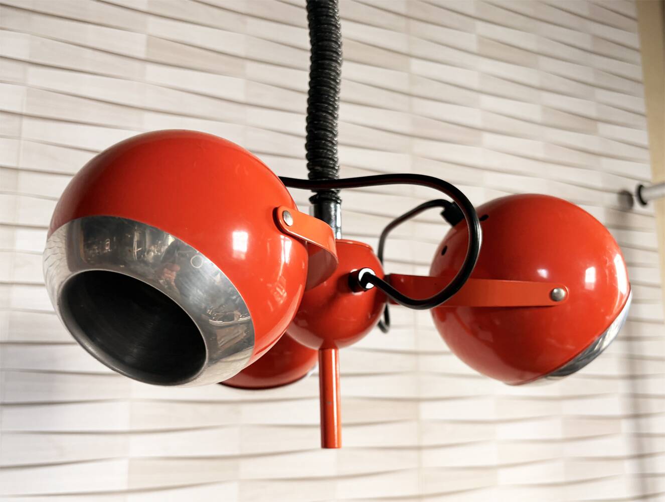Suspended eyeballs, space age, bright orange, vintage, 70s