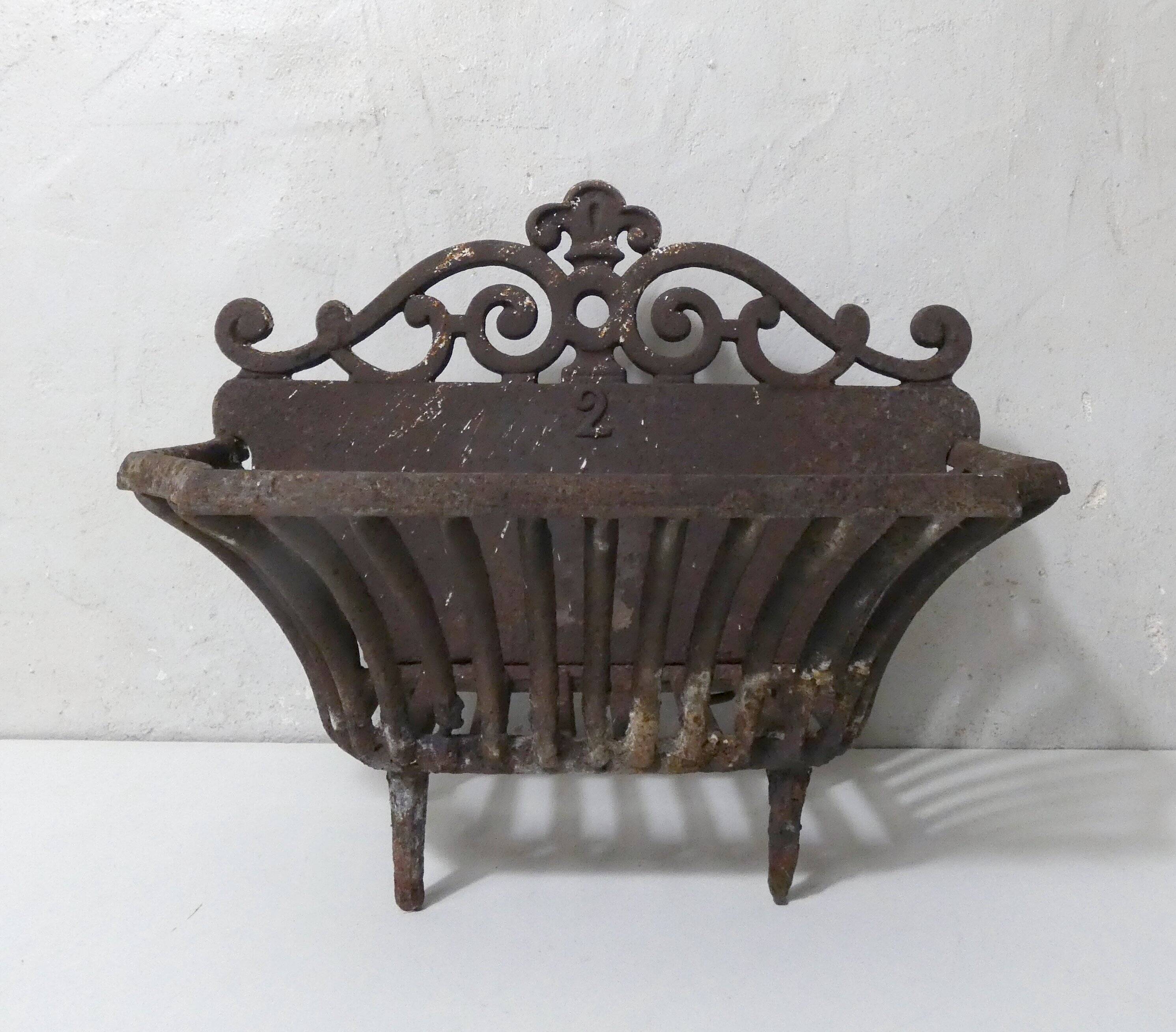 vintage cast iron log holder