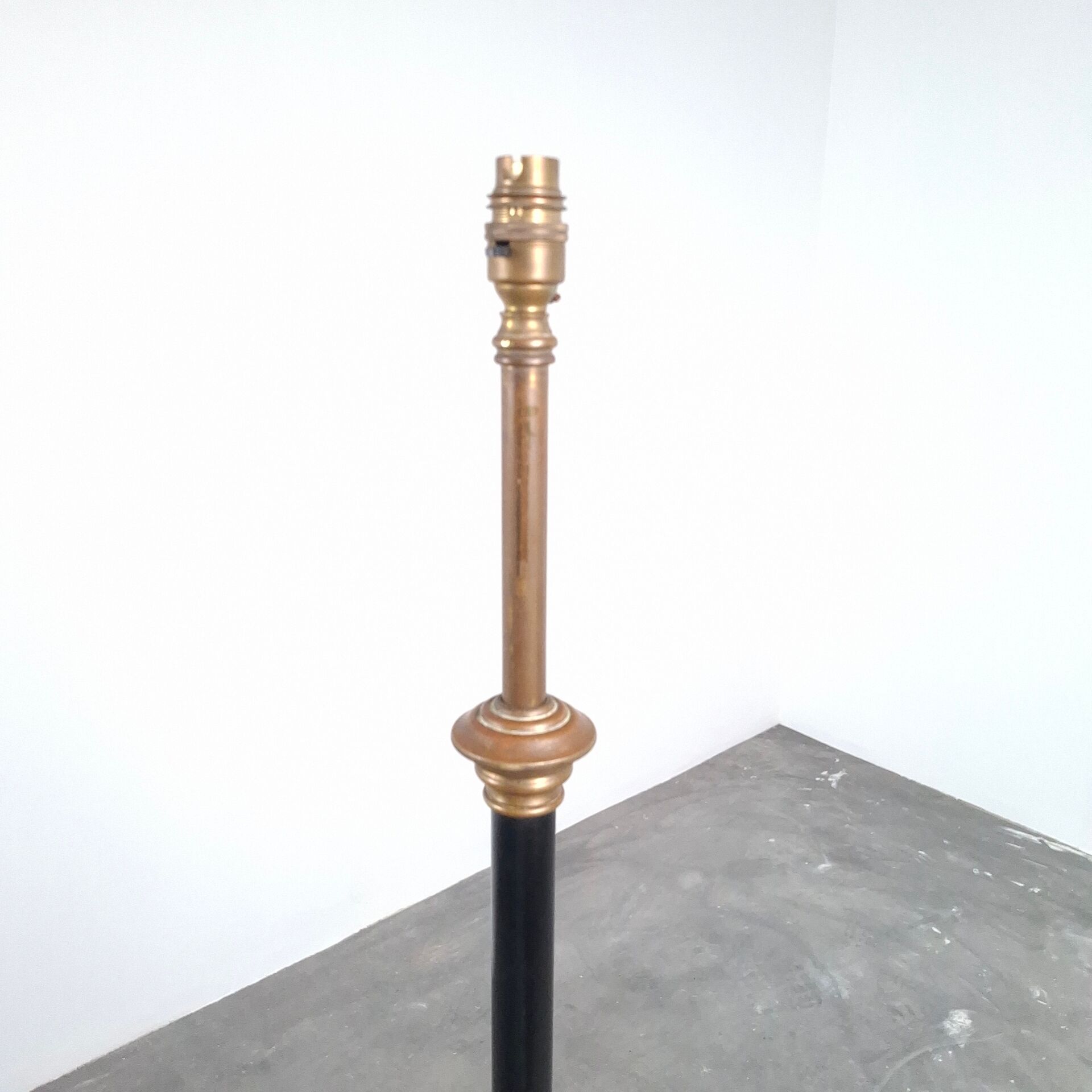 Art and Craft tripod floor lamp in bronze.