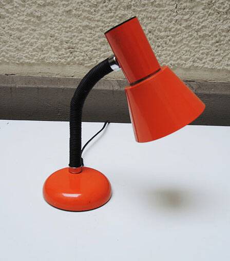 Old orange enameled sheet metal lamp