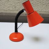Old orange enameled sheet metal lamp