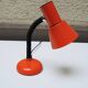 Old orange enameled sheet metal lamp