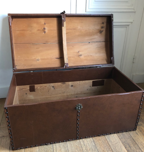 Ancient wooden and faux leather trunk