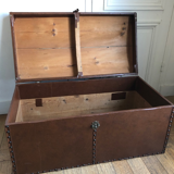 Ancient wooden and faux leather trunk