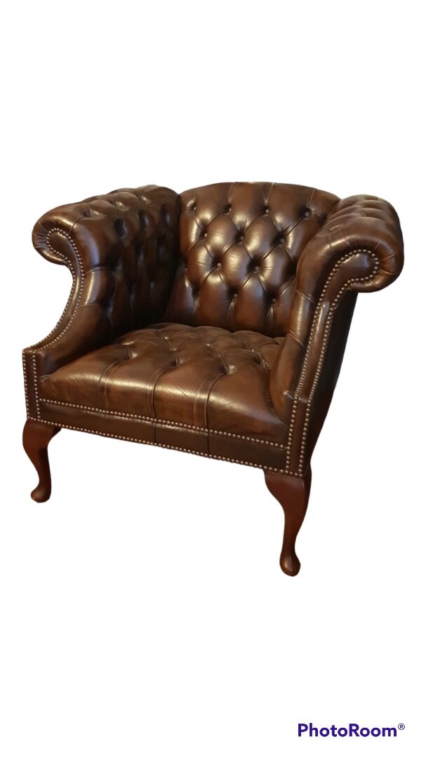 Pair of leather Chesterfield armchairs