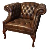 Pair of leather Chesterfield armchairs
