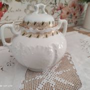 White porcelain sugar bowl decoration in relief and green and gold frieze
