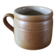 Vase terracotta milk jug with a glazed interior handle.
