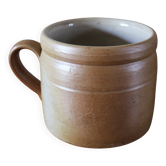 Vase terracotta milk jug with a glazed interior handle.