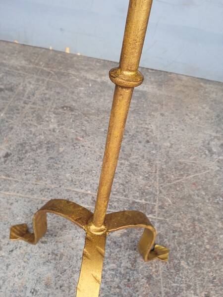 Minimalist brutalist gold metal pedestal table