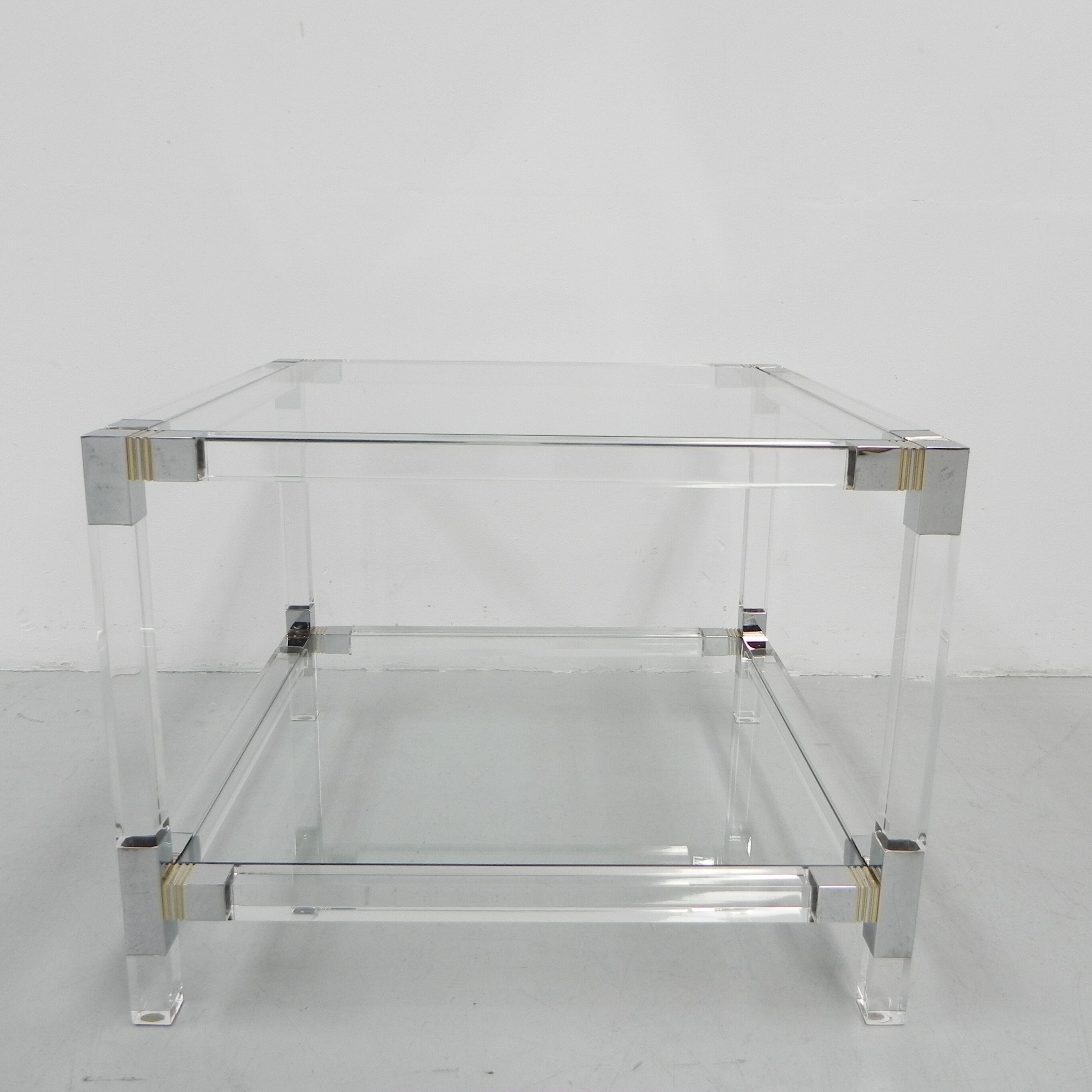 Hollywood Regency coffee table with perspex frame
