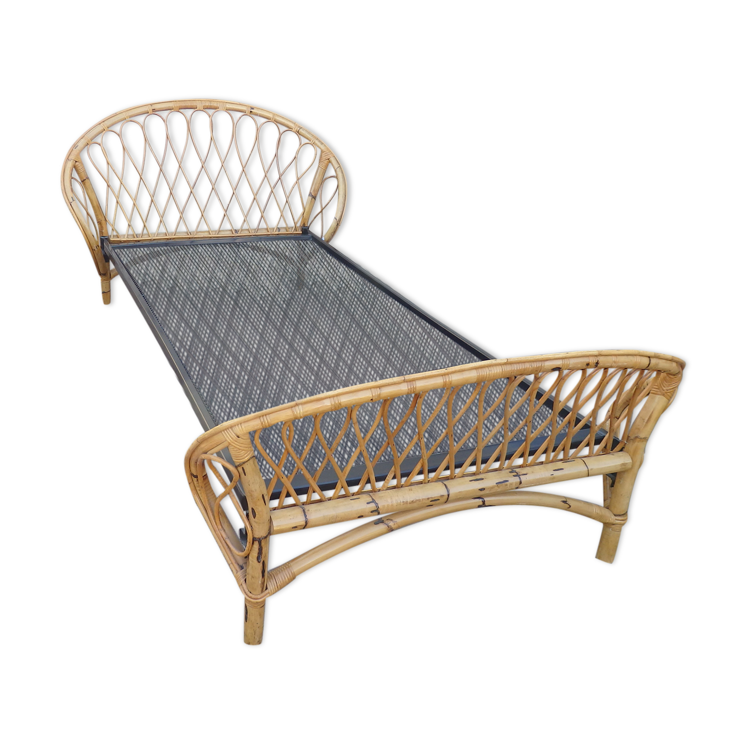 Vintage single bed in rattan