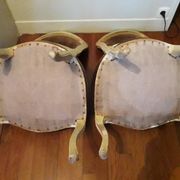 A pair of Louis XV style armchairs in wood and velvet fabrics