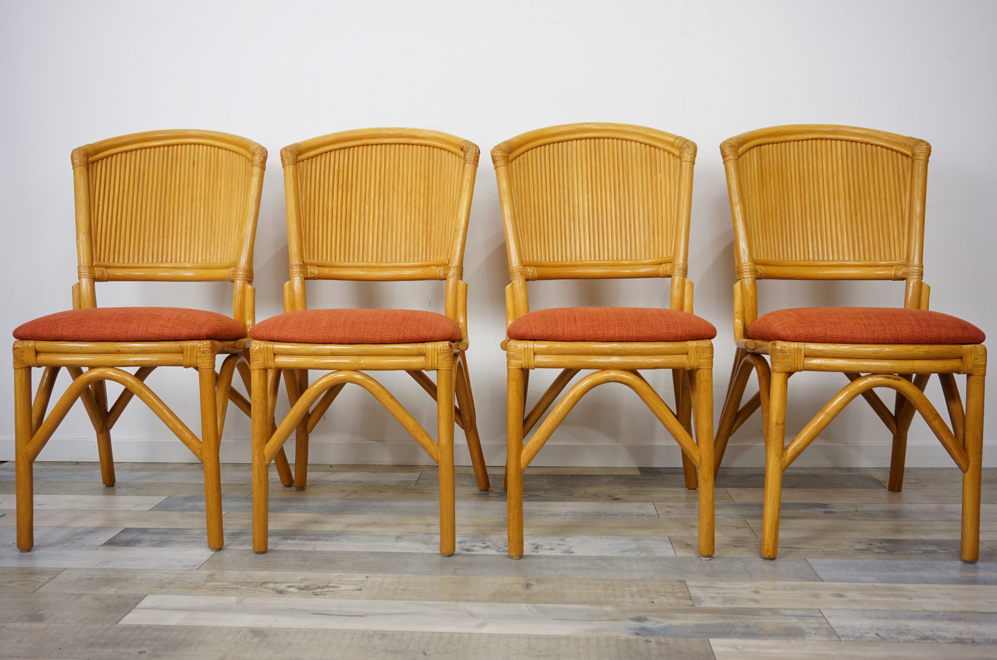 Suite of 4 chairs in Italian rattan design from the 60/70