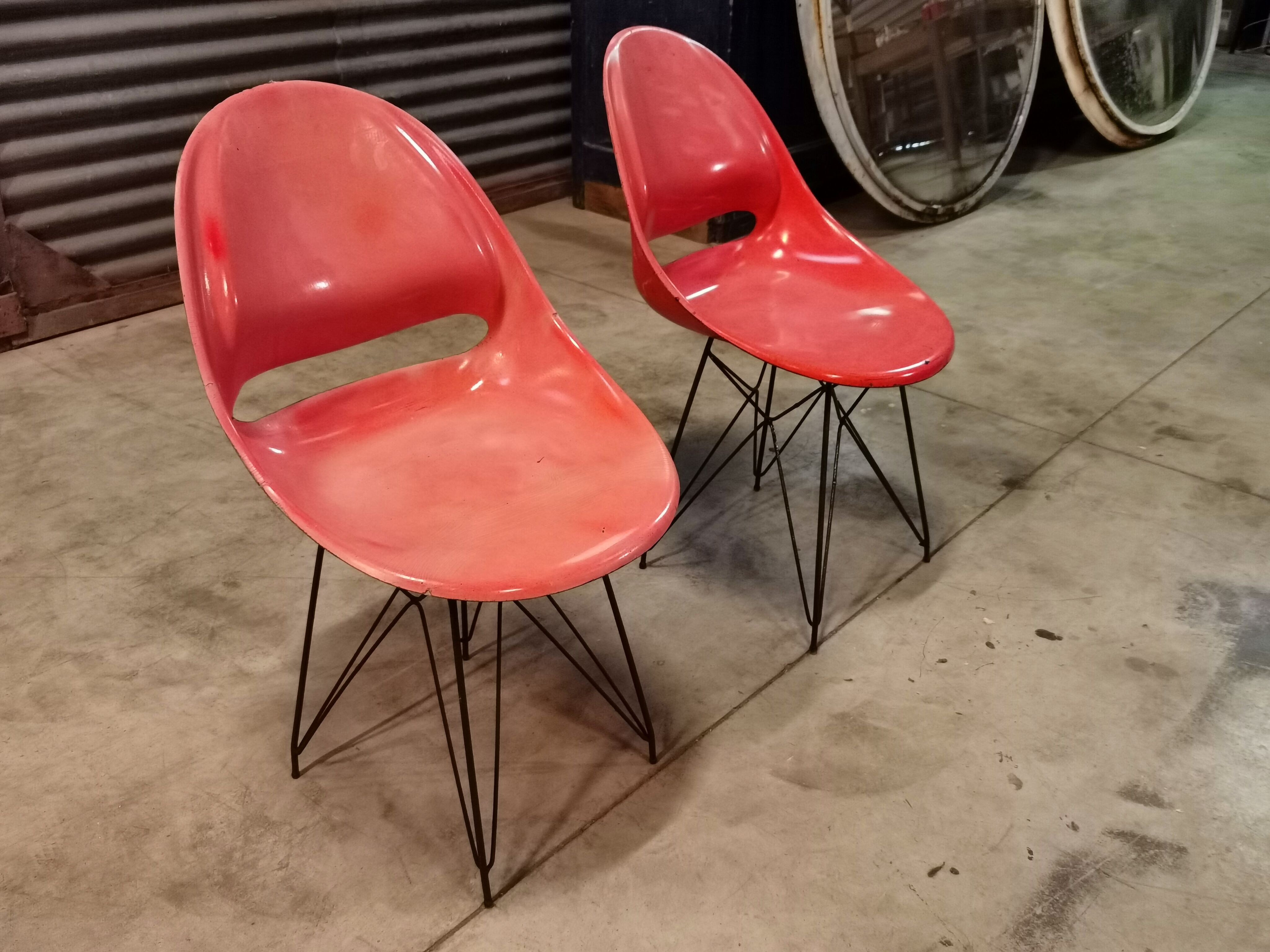 Pair of red chairs by Miroslav Navràtil for Vertex 1959