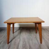 Coffee table with wooden compass legs