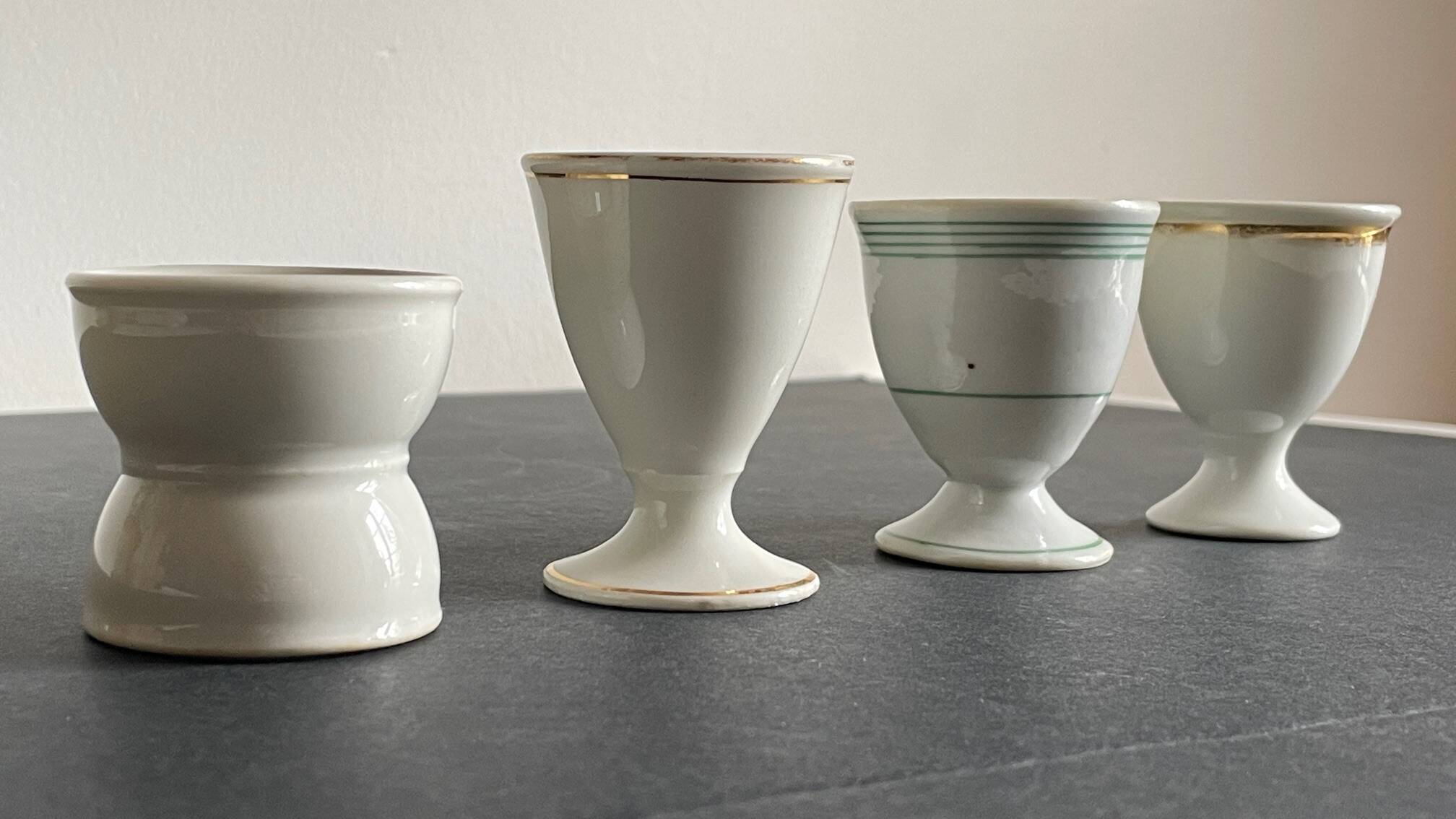 4 antique ceramic egg cups