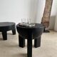 Black mango wood tripod side table with a semi-spherical top, height: 45 cm, diameter: 44 cm.