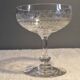 8 antique Baccarat crystal champagne coupes with engraved decoration.