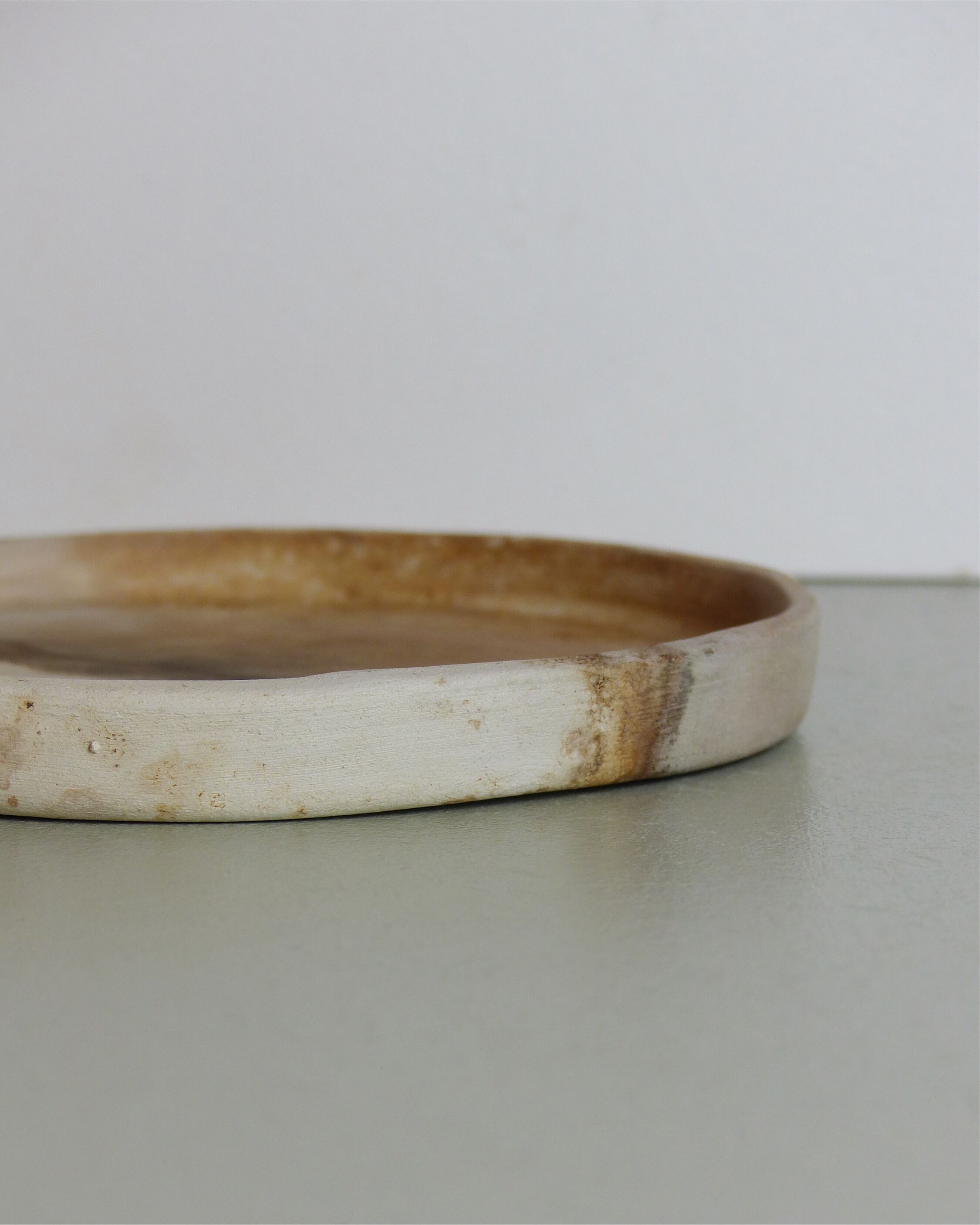 Beige tidy or centerpiece