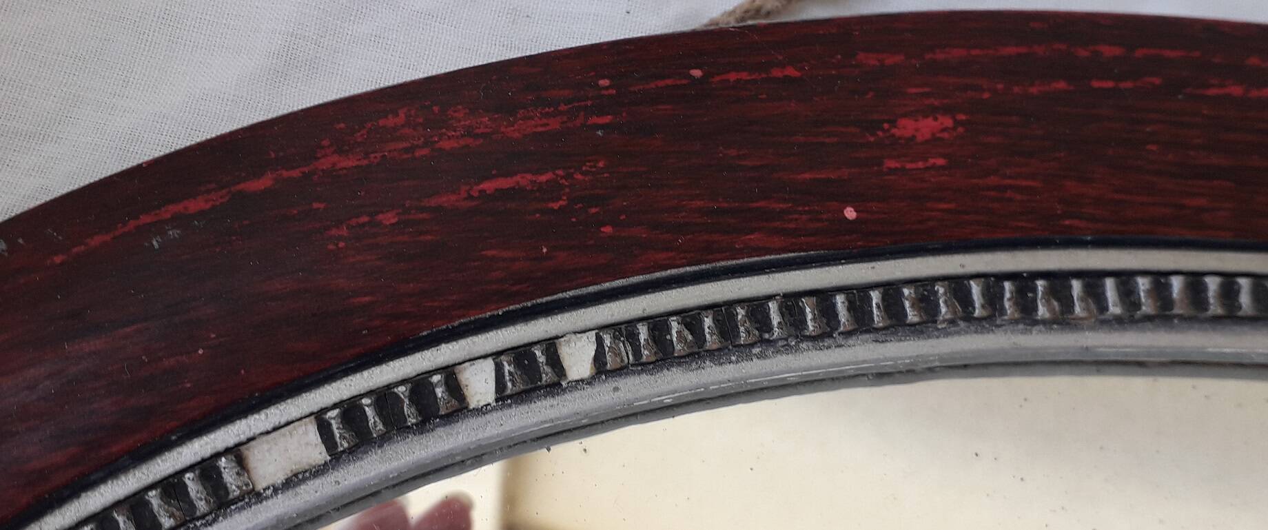 Oval wooden mirror