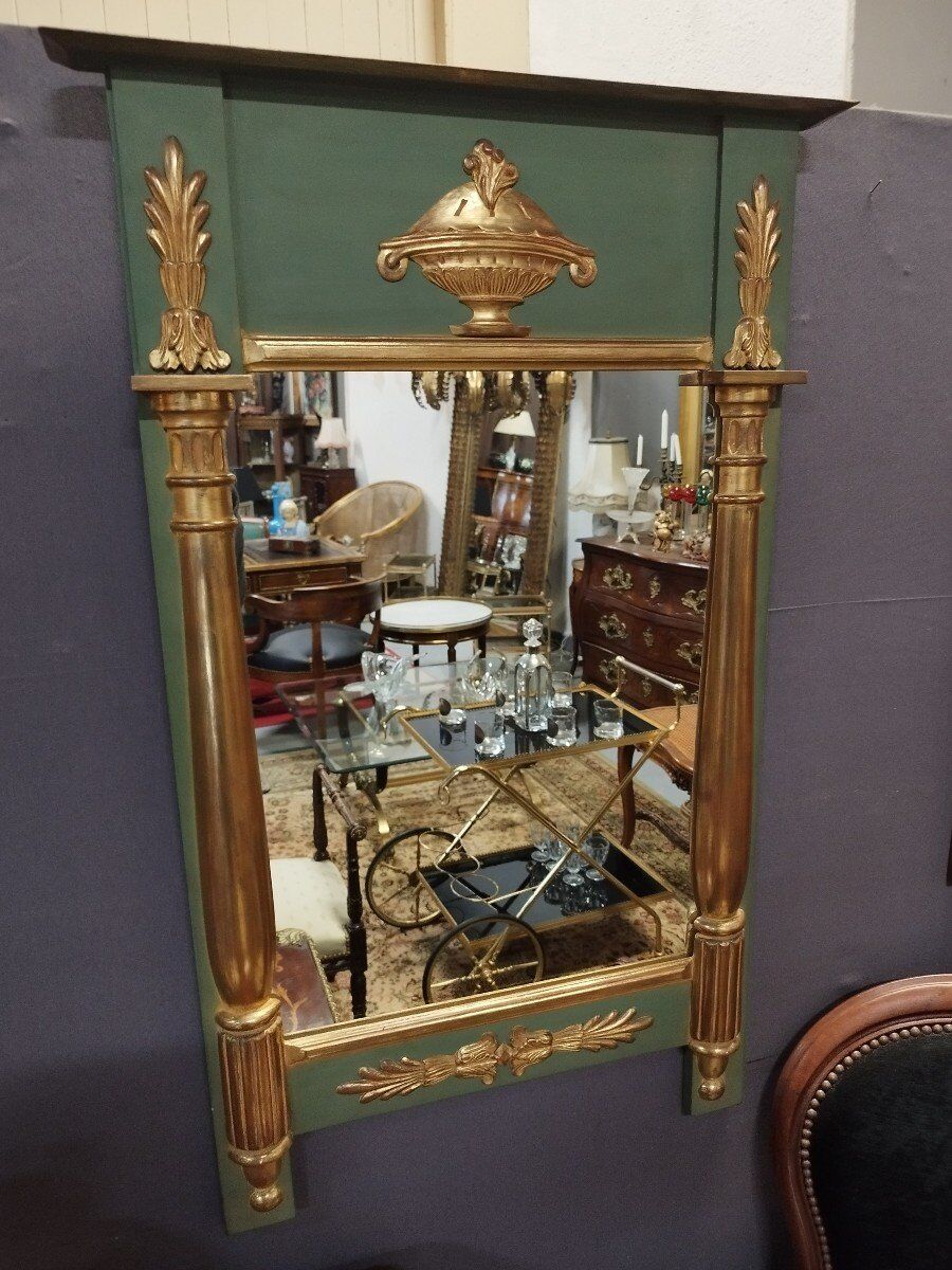 Empire style mirror with double patina
