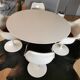 Dining room table with tulip leg