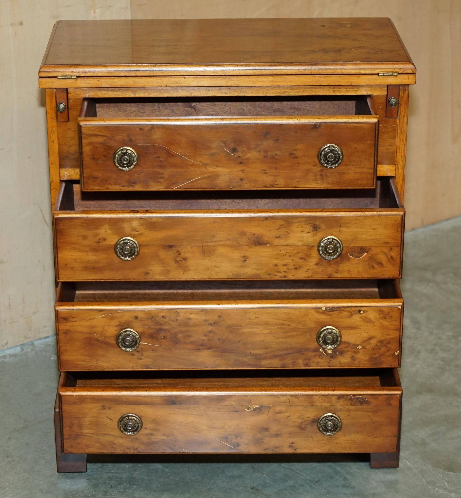 Vintage walnut commode with sliding top in Butler style.