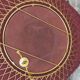 Vintage 1950s sun mirror in gold metal.