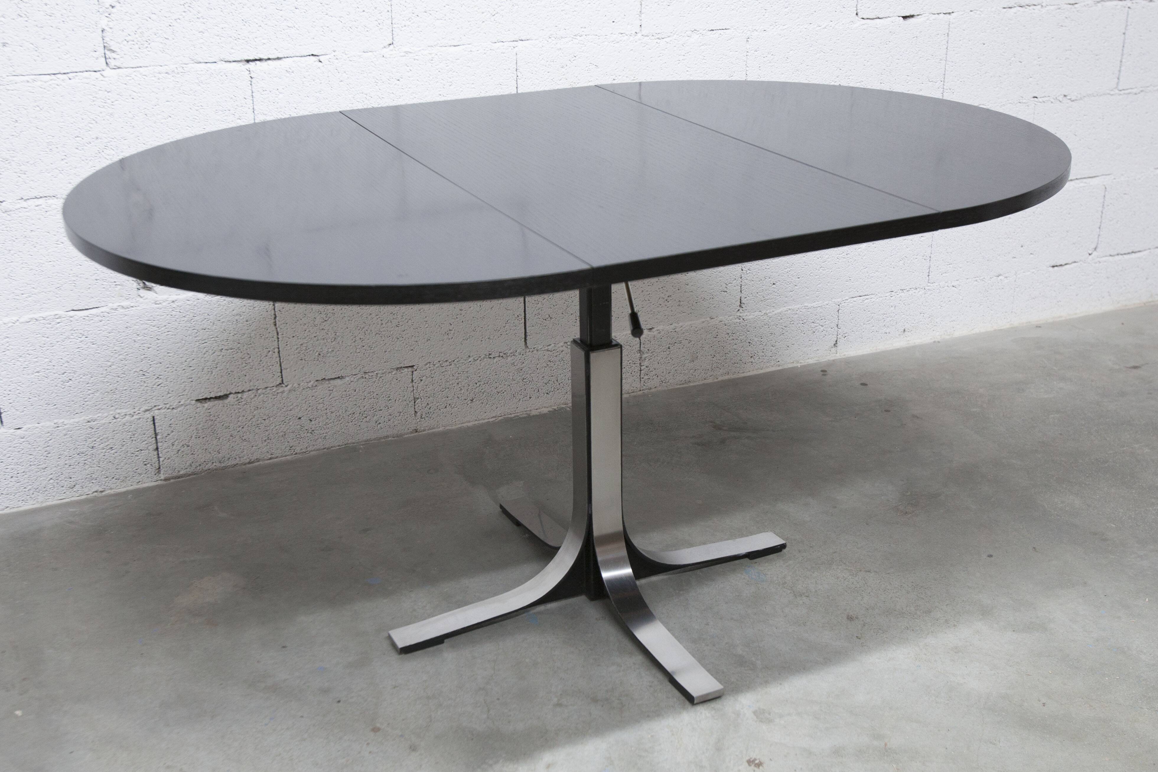 Round table rises and lowers Osvaldo Borsani black and chrome with extension