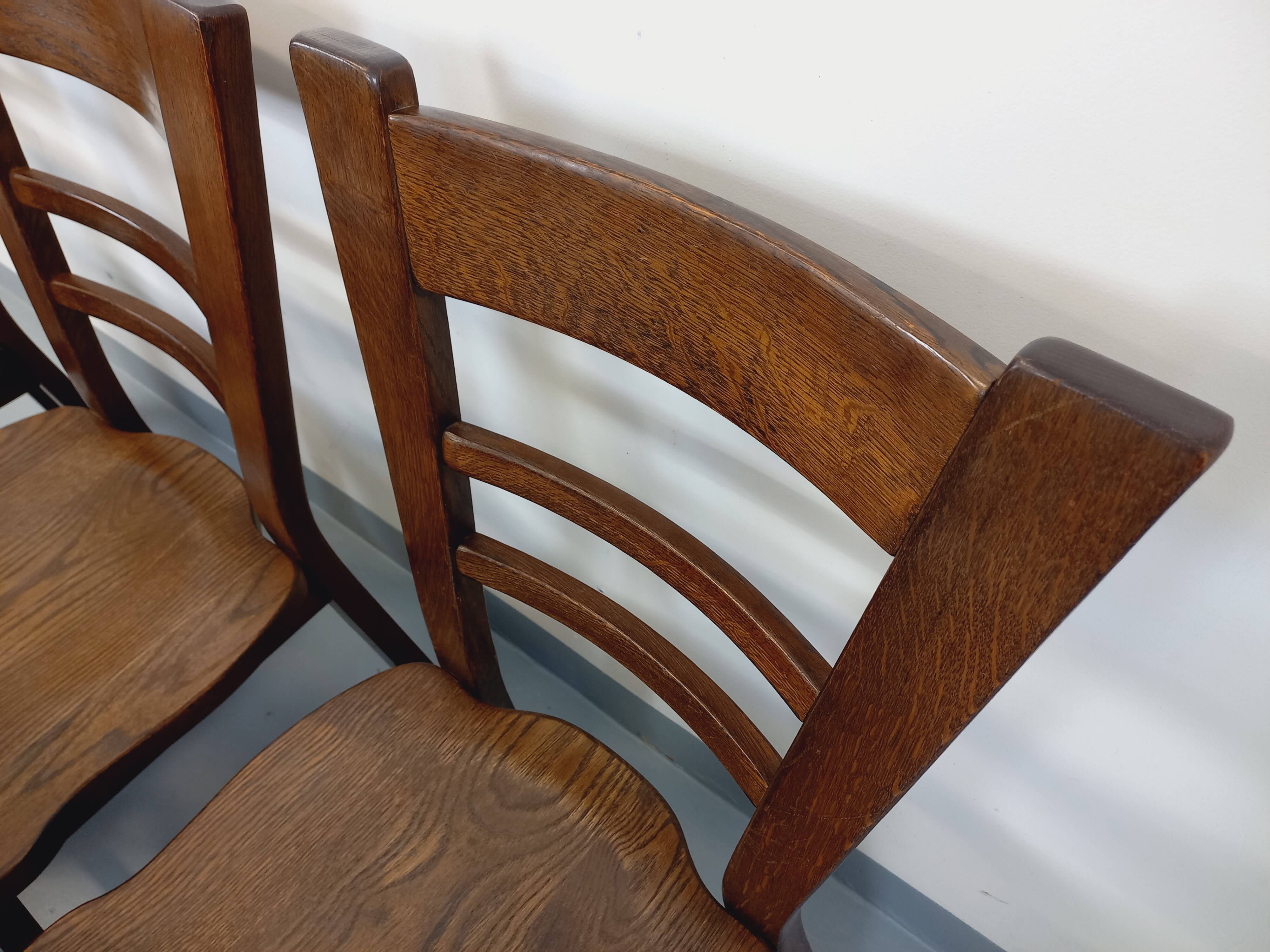 Set of 6 vintage brutalist oak chairs from the 1950s.