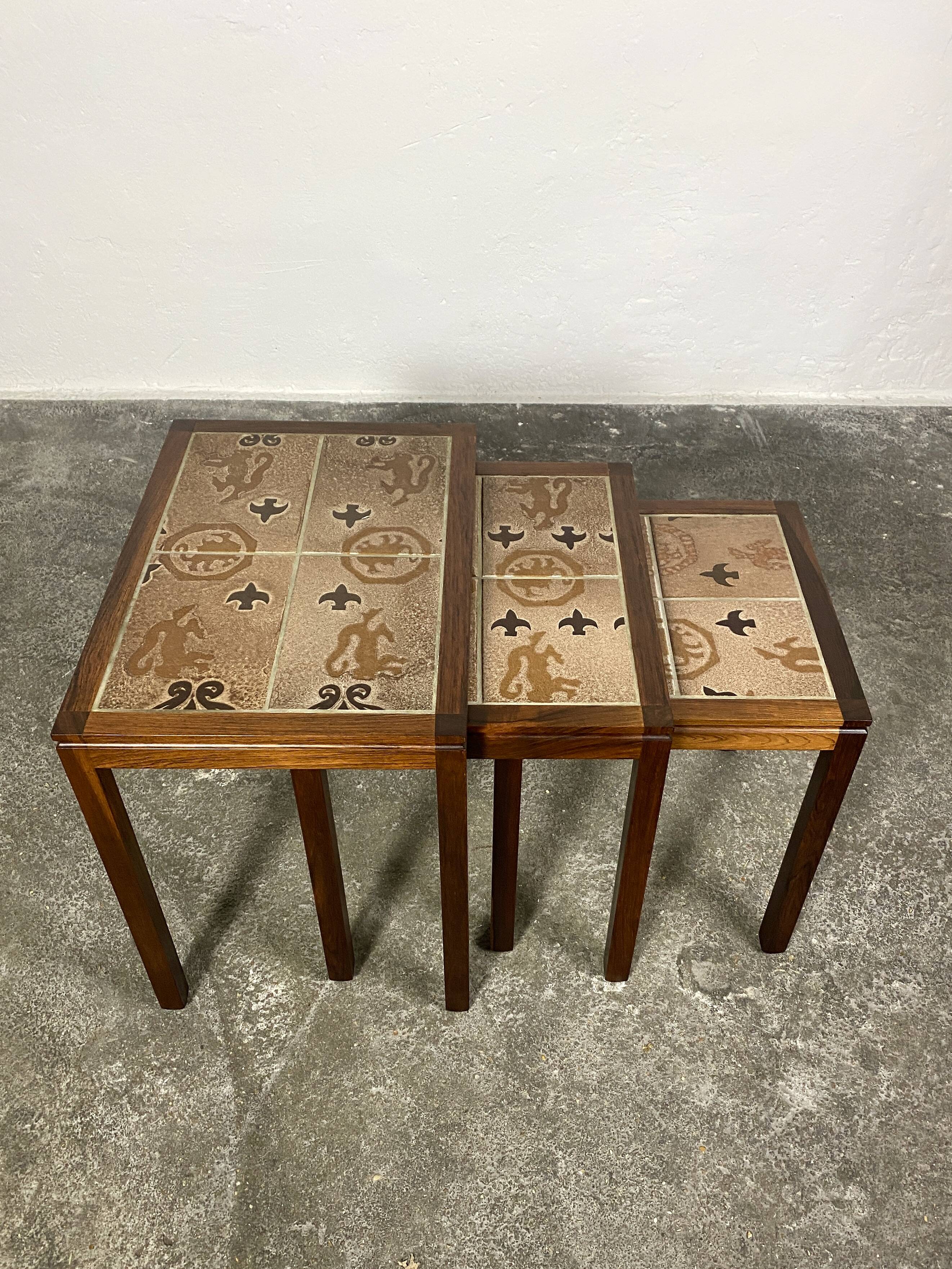 Danish nesting tables in rosewood and ceramic by Willy Ryomgard, Mo.