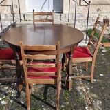 Round wooden table with 1 integrated extension + 6 wooden and fabric chairs